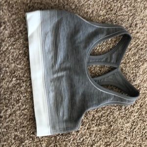 A grey jockey sports bra